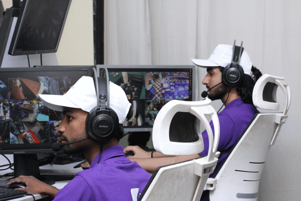 Professional CCTV monitoring center with multiple screens
