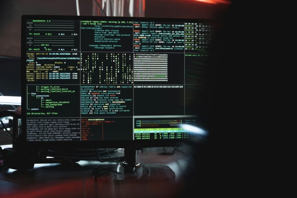 Cybersecurity control room with monitors showing security dashboards