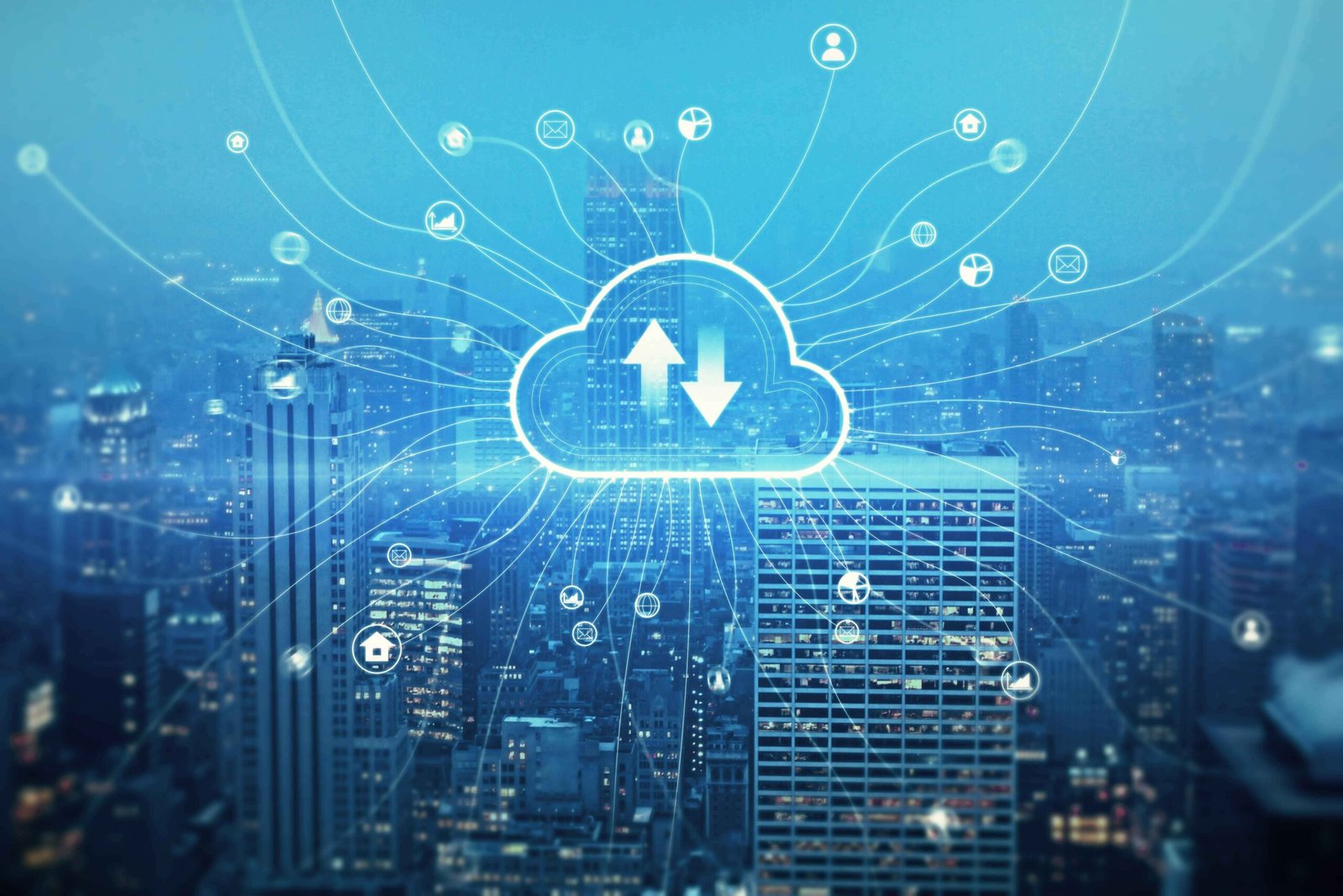 A cityscape at night featuring a central glowing cloud icon with network connections, symbolizing the use of cloud storage for accessing CCTV footage and real-time video surveillance data