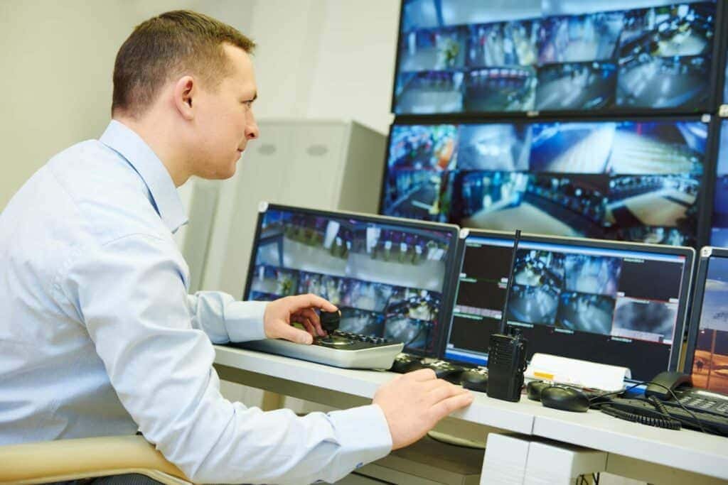GCCTVMS virtual security guard operator conducting live camera patrol with real-time threat detection and security guard surveillance