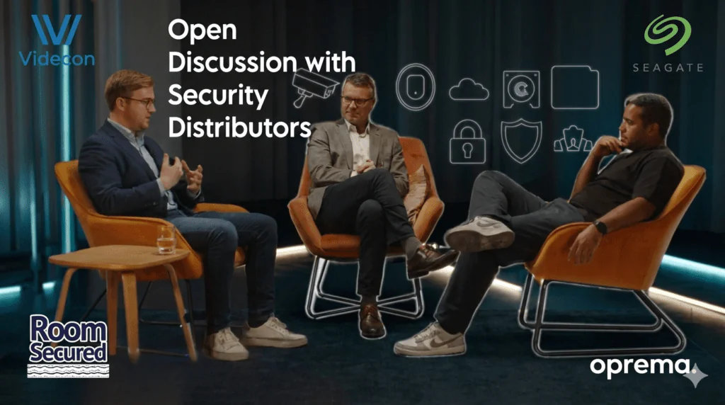 An image featuring a discussion among top Security Distributors in the UK, debating the impact of Cloud CCTV, the Security Workforce Crisis, and the future of CCTV Distribution in 2026